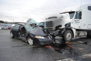 Trucker Accident, collision between a car and a truck