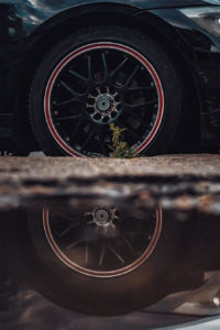 Car accident, cropped photo of a car tire